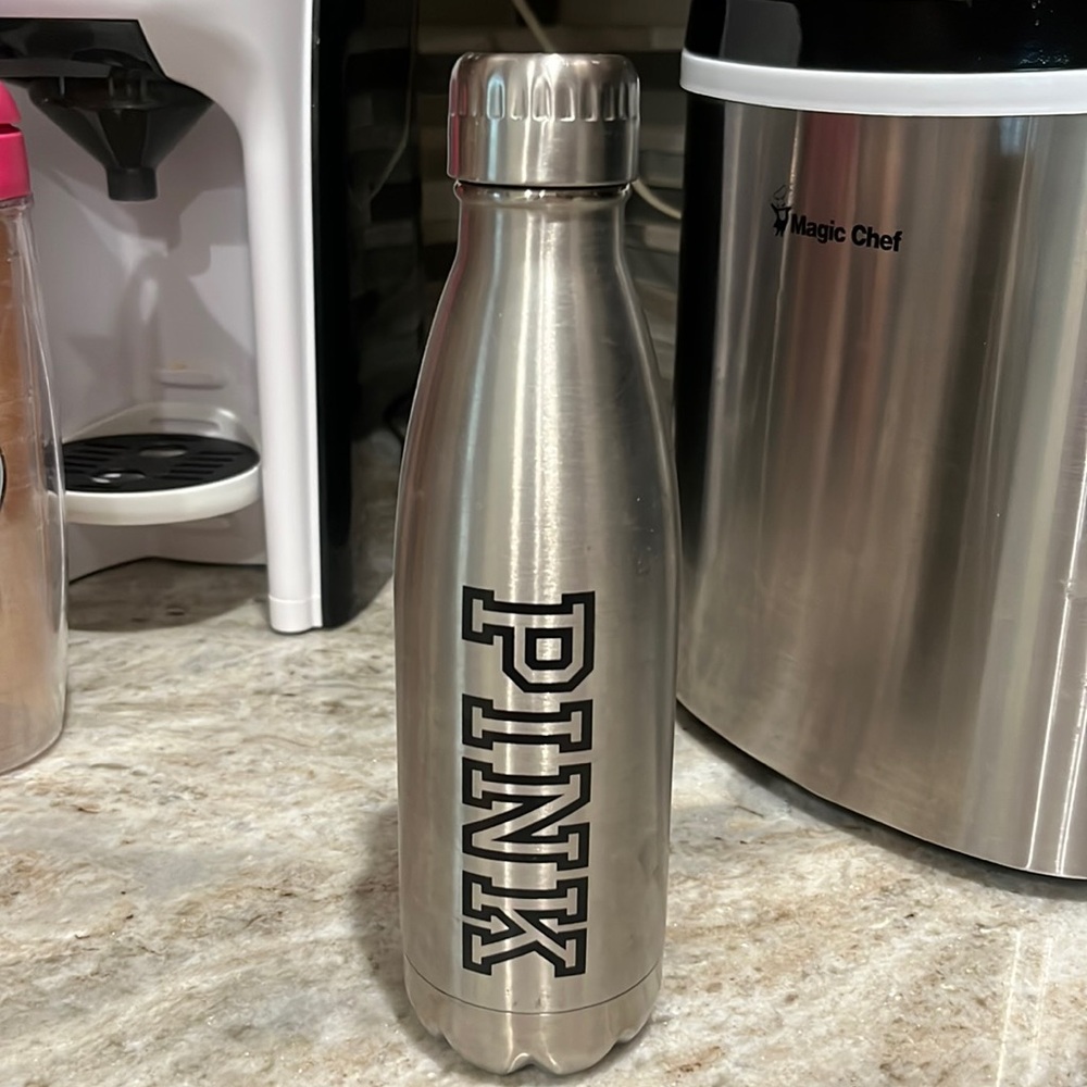 Victoria’s Secret pink - metal water bottle with screw top lid.